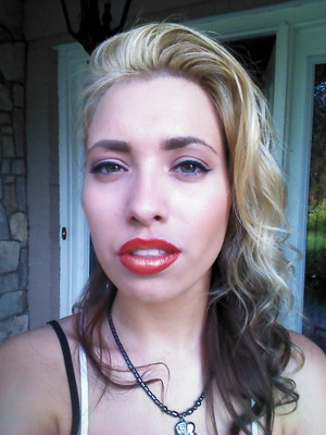 Changed up my hair a bit…again, playing with some red and gold lips too =]