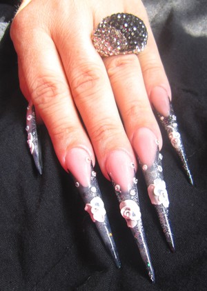 Hi i'm a french nail artist 
all my creation on: http://www.facebook.com/nailart.by.vanessa.d
if you like my work share it on your facebook page
see you soon
VANESSA