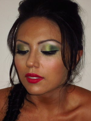 lime green to dark green eyes teamed with a red sexy lip and a brushing of pink blush 