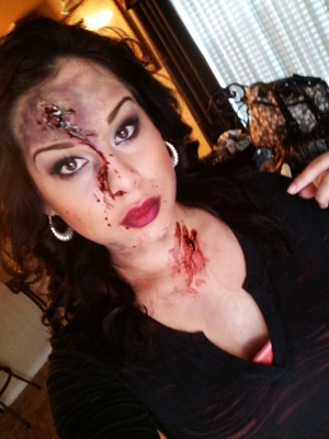 This is what I was for Halloween. All work was done by MYSELF. I also used toilet paper and made the blood myself.