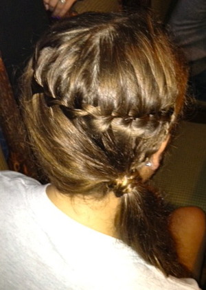 I did a waterfall braid on my cousin that I pulled into a side ponytail and wrapped the braid around the elastic. 