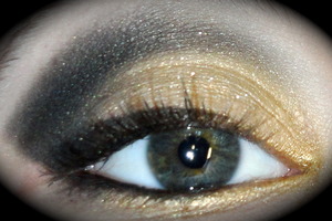 My eyes- an inspired look from a video from xsparkage. Using gold & black :)