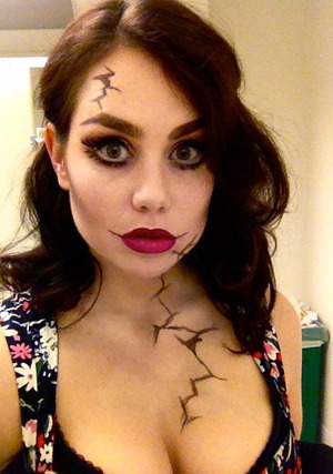 A bit messy, but an easy last-minute costume. I didn't have time to pick up any false lashes, so I drew them instead! 