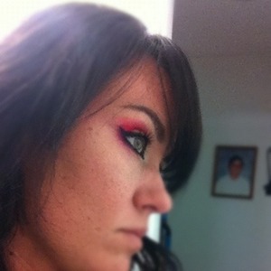 Hot pink and yellow shadow 
With plum gel eye liner