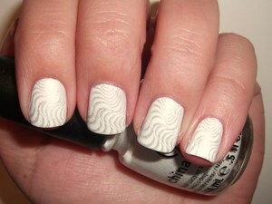 China Glaze White on White is my new favorite white polish. It's so nice and opaque in 2 coats! :)