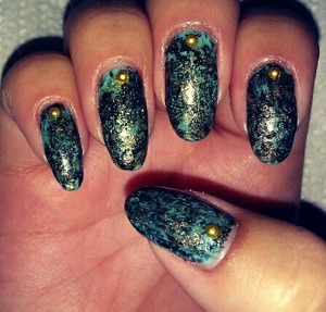 turquoise green nails with black and gold marble and gold pearls!! the gold doesn't pick up so good in this pictures :/