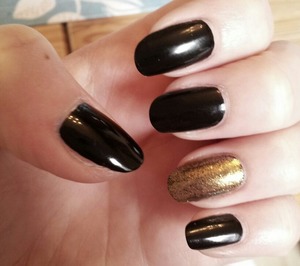 'Goldeneye' by OPI and 'liquorice' by Essie