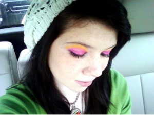 pink and yellow shadow with falsie looking eyelashes,  but those are my lashes ;)