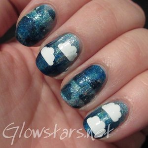 Read the blog post at http://glowstars.net/lacquer-obsession/2014/12/cloudy-gradient-using-lokis-nail-vinyls-and-nail-aprons/