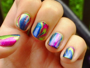 Latest water marble... mom said it looked like an oil slick "but in a good way" (left hand)