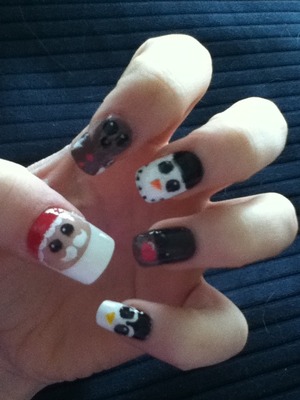 I used Migi Nail art pens: white, black, red, orange, yellow and pink. I also used Kiss: Everlasting French nails. I got the design from  IHaveACupcake