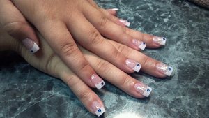 Acrylic Nails build with CND Acrylic + sparkle and blue heart rhinestone accents
