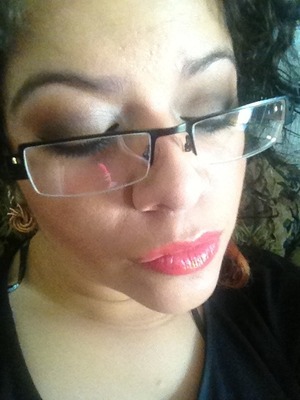 Neutral eyes paired with a coral lipgloss :)