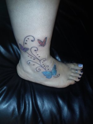 faith tattoos on foot