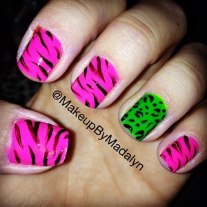 Zebra/leopard print nails.