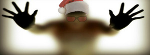 Santa hat and glasses on a blurred image. 