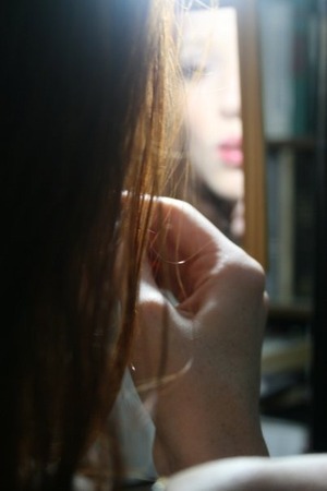 I thought this was a pretty cool pic taken of me putting on lip gloss:)