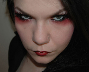 Red & black gothic make-up. Model: myself.