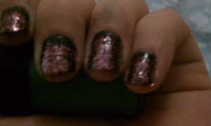 black polish with pink glitter