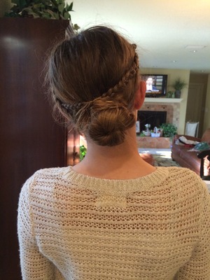 Love this easy, fresh spring look! Do two braids on each side near your hairline near the forehead braid until the end of the hair. Create a low ponytail and twist it into a low bun. Wrap the braids around the bun in any fashion. I added a leather headband be careful not to mess up your bun when putting it on. Afterwards scrunch your bun a bit to create a messy/worn look and spray the look with hairspray to hold it all day
