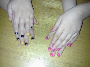 Batman colors on my oldest and pink with glitter on my youngest.