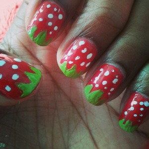 These strawberry nails are pretty easy to do, and the white.polka dots stay on forever so it's excellent if u don't like to be constantly replacing ur.nail art<3;)