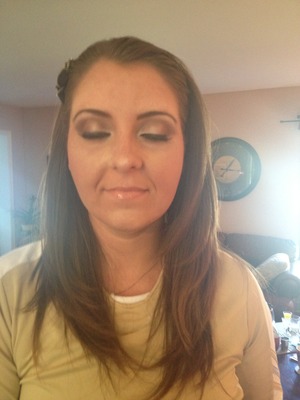 Client requested luminous gold and brown eyeshadow, fake lashes, very natural airbrush, peachy-bronze blush, and glossy nude lip 