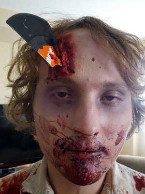 Our subtle homage to "Shaun of the Dead". Part of my fiance's makeup for the Trash Film Orgy Zombie Walk in Sacramento.