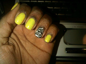 The yellow is from NYC, the flaky topcoat is from Essie's luxeEffects, and the zebra print is SH 