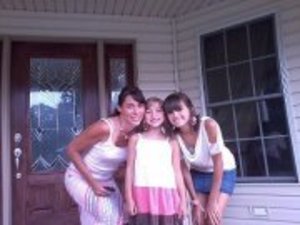 This is me and my mom and my little sister.
