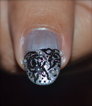 See the video Tutorial https://www.youtube.com/watch?v=LfBJ7T1MmKM
For more pics visit http://www.gorgeousnailschannel.com/2014/11/easy-lace-nail-design.html
Follow me on :- 
YouTube : https://www.youtube.com/user/SuperGorgeousnails 
Blog : http://www.gorgeousnailschannel.com 
Facebook : https://www.facebook.com/SuperGorgeousNails 
Twitter : https://twitter.com/DemiNails123 
Pinterest: http://www.pinterest.com/deminails123/