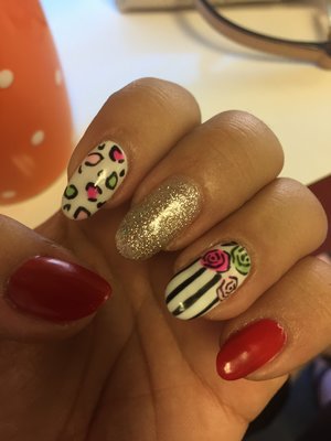 Cheetah print nail art with glitter, red, silver, stripes, pink, green, roses, natural nails, gel mani 