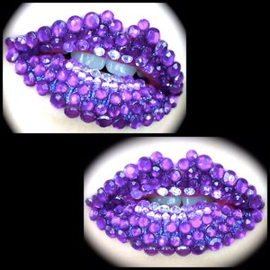 http://michtymaxx.blogspot.com.au/2014/03/amethyst-kisses-lip-art-tutorial-ft-eye.html

 was in the mood for some lip art and I pulled up an idea I had involving MAC Violetta & purple rhinestones. I added some extra little details like a gradient with Lime Crime Poisonberry and some glitter under the stones with Eye Kandy's Jelly Bean. 