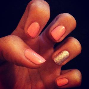 Glossy pink nails with a silver glitter accent nail!