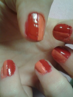 Red (Sally Hansen "Cherry Red") and coral (Wet N Wild "Blazed") two-toned nails.