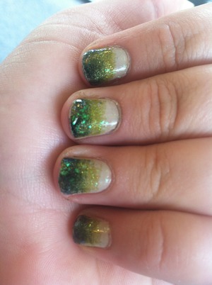 Green ombre, the Zoya color I used is Edyta and the China Glaze is Zombie Zest and I used Finger Paints Flecked flakie polish over the whole nail. 