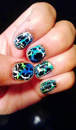 a green and blue sea like water marble with a crackle overcoat