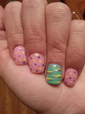 Got my nails done for Spring/Easter and came up with this.   Pastels are soo in right now, so can't go wrong with baby pink,  light teal, with light yellow and purple accents.  What do you guys think...?  Please let me know!!! 