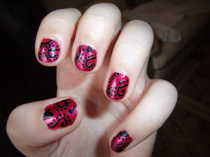 Red nails with decorative motifs. Hope you like them!