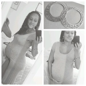 Hair: $125, Ever so comfy Maxi dress, Tribal earrings, and a WHOLE lot of baby. 