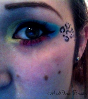 Bold, and colorful eyes, with sparkly cheetah print! Find this tutorial on YouTube! Channel Name?: MadOverBeauty.<3