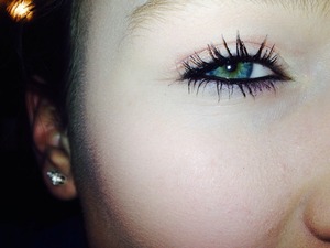 Eyeliner and mascara brings out my green eyes so much.