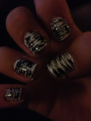 White nails with a black splash