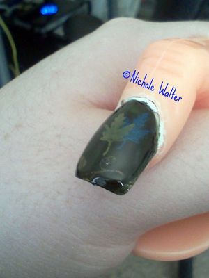 I will be doing these on my own nails. jst wanted to show a little preview. The green, which looks black, is NYC long lasting wear or something like that in Flat Iron Green.