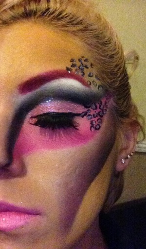 Fantasy makeup, cut crease,glitter, cheetah print, saint germain lipstick, pink eyebrows,