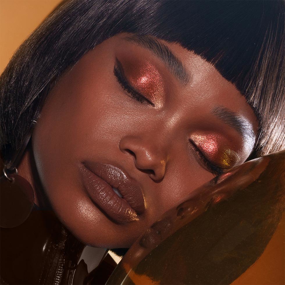 Natasha Denona model wearing the I Need a Warm Eyeshadow Palette