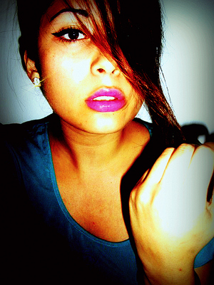 Glamorous look, hot pink lipstick with winged out liquid eyeliner                                                    