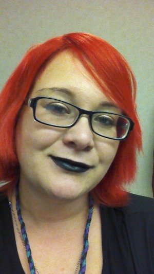 I found a great black lipstick and I think it pairs really well with my bright reddish pink hair.