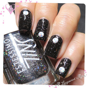 Holographic metal studs over Estessimo TiNS #025 The Saturn.
More on the blog: http://www.alacqueredaffair.com/Born-Pretty-Store-Nail-Accessories-Part-I-35050391