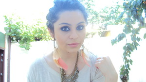 feather earings,navy and gold smokey eyes :)